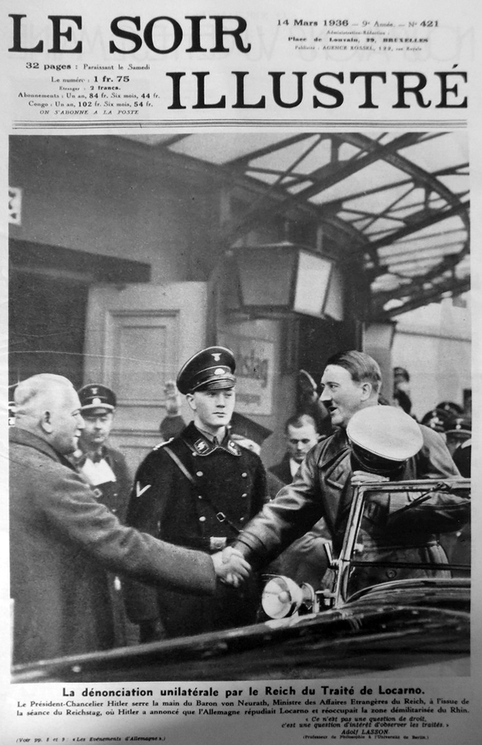 Adolf Hitler shakes hands with Konstantin von Neurath after his proclamation to the Reichstag for the remilitarization of the Rhineland